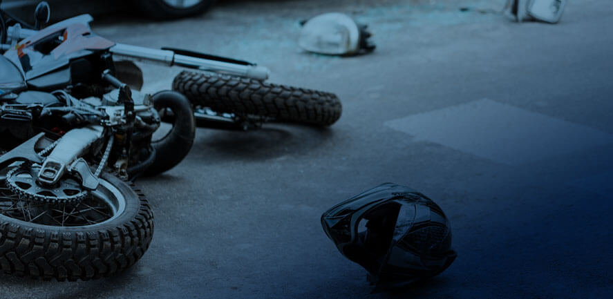 Motorcycle on its side after a crash | Wisconsin motorcycle accident attorney